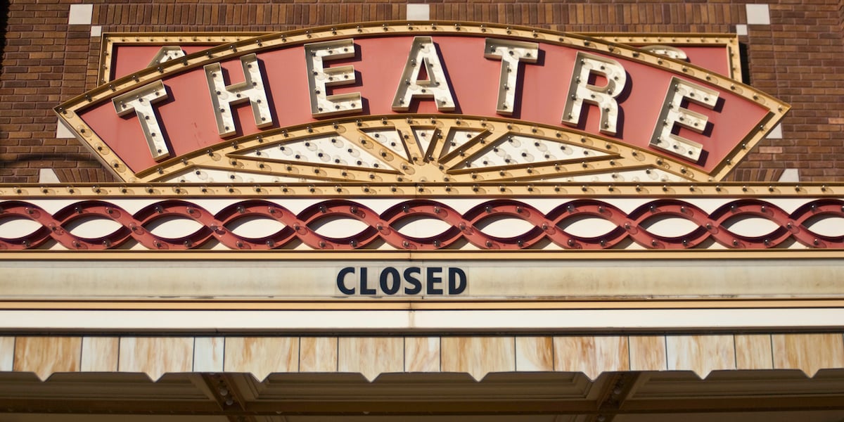 Closed sign on movie theater