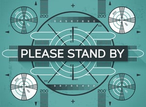 Please Stand By