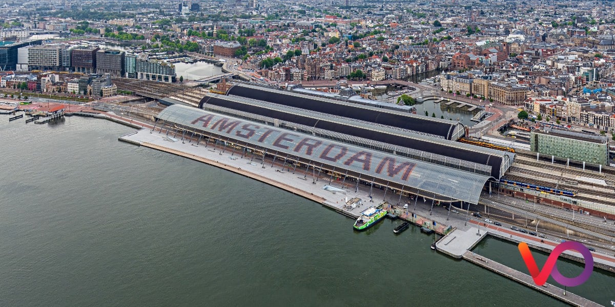 Aerial view of Amsterdam CS station with word Amsterdam highlighted on roof