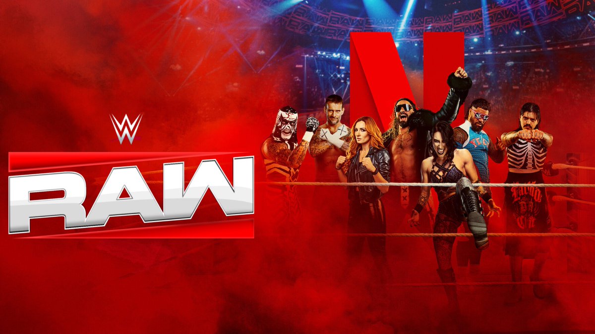 A group of WWE wrestlers stand in a wrestling ring, surrounded by red smoke. The WWE RAW logo and a large Netflix N appear in the background, with a cheering arena crowd.