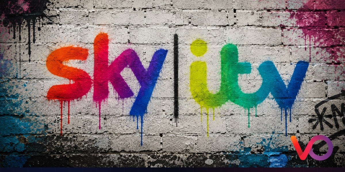 The Sky and ITV logos depicted as graffiti on an urban brick wall